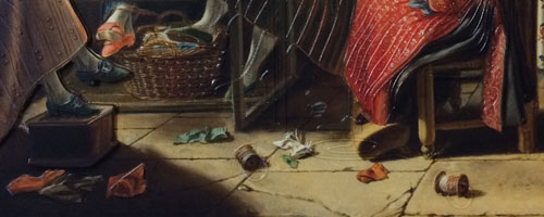 D&eacute;tail de l'huille sur toile : bobines de fil, morceaux de tissus au sol.